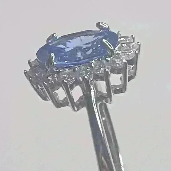 STERLING SILVER BLUE TOPAZ & SIMULATED STONES SET AROUND CENTER. - Picture 4 of 4